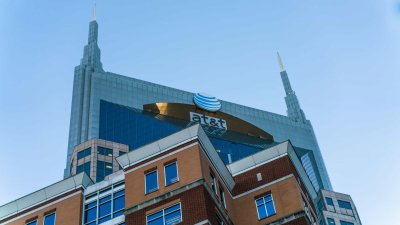 Акции AT&amp;T достигли максимума за 3,5 года благодаря приросту числа абонентов